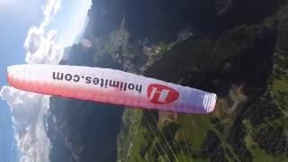 Paragliding over the Dolomites with Holimites