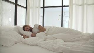 Sleeping Man In Bed With White Linens At Light Bedroom | Stock Footage - Videohive