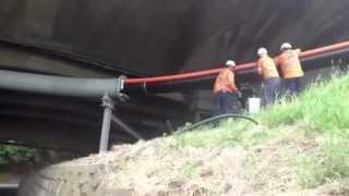 Cable and fibre ducts being installed under the Auckland Bridge