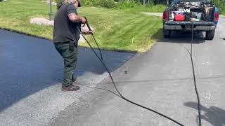 Professional Asphalt Spray Sealing: "The Clean One"  Top Coats Pavement Maintenance