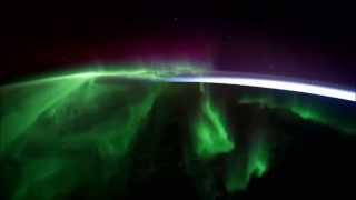 Aurora and city lights from space (Interstellar Soundtrack)