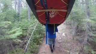 Portaging around Grand Falls on the Seboeis River, Maine