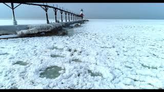 Frozen Ice Waves on Lake Michigan Lighthouse 4K Must see very rare!