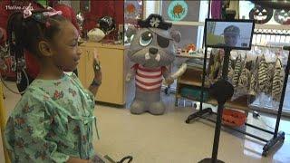 Robots at the Children's Healthcare of Atlanta help to transport the fun to kids who may not be able