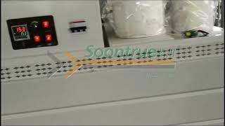 Maxi roll shrinking machine with labeling device --- Shanghai Soontrue