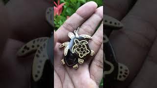 Turtle coconut shell pendants.