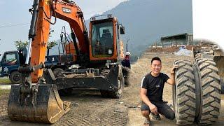 Rescue repair new excavator dx140 flat tire at construction site giang's daily work