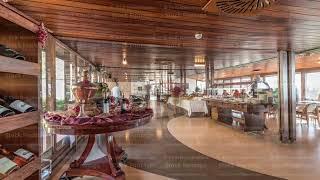 Panorama showing morning catering buffet food indoor in luxury restaurant with meat, colorful fruits