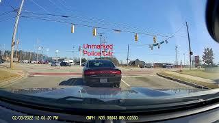 Driver pulled out in front of unmarked police car