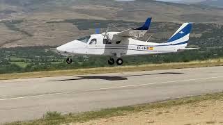 Tecnam Twin engine is making touch and goes at Cerdanya Aerodrome.