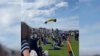 Parachutist lands on woman and child during San Francisco Fleet Week air show