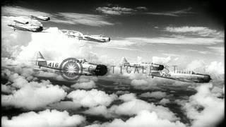 Pilots don high altitude suits and fly aircraft in formation in the United States...HD Stock Footage