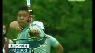 Guy shoots arrow through another arrow