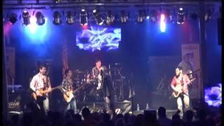 Tom Kief, WIIL Rock 95.1 on stage with Bella Cain