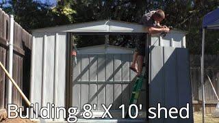 Arrow Newport 10 ft. x 8 ft. Galvanized Metal Storage Shed with Sliding Lockable Doors Installation.