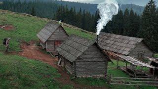 Almost abandoned log cabin in the mountains, This is where the shepherds live, far from civilization