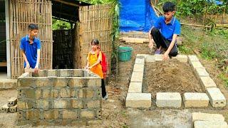 The orphan boy used bricks and cement to build a water tank right in front of the kitchen door.