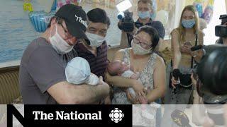 Parents reunited with babies born to surrogates in Ukraine