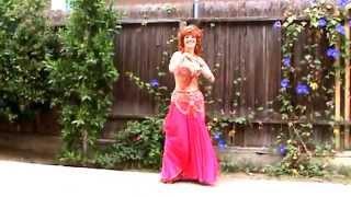 Ameynra bellydance - Sofia Goldberg, model in pink. Exotic hairstyle