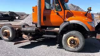 International 7600 truck selling at John Peck Auctions