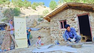 Nomads: Painting the doors and windows of the shelter with the help of a kind man