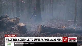 Wildfires continue to burn across Alabama