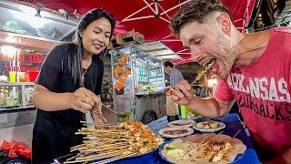 Cute Indonesian girl challenges me to eat 100 SPICY Sate 