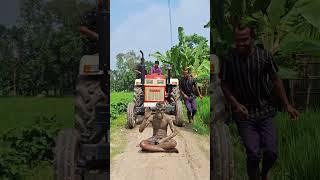 Tractor behind the statue.#shorts