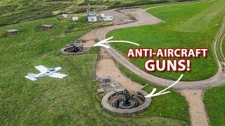 Why have they got ANTI-AIRCRAFT GUNS protecting this runway?