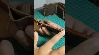 Handmade leather wallet with a coin pocket, crafted from premium full-grain leather. #menswallet