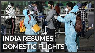 India resumes domestic flights amid confusion, chaos at airports