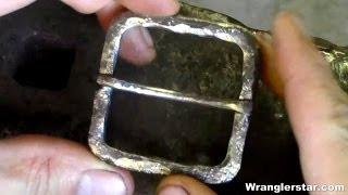 Blacksmith Forging A Belt Buckle