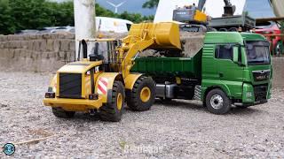 RC Construction Trucks Digger Wheel Loader Dozer at work on the Outdoor Course in Bredenborn NRW