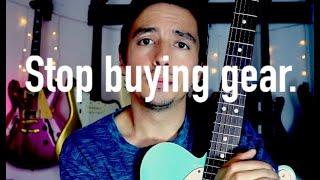 Guy who sells guitars tells you to stop buying gear.