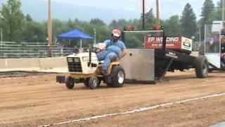 Stock 16hp Cub Cadet pulling garden tractor