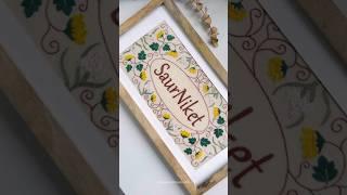 Saurniket! ️ Hand embroidered name plate. #bespokebysaurabh #handmade #threadwork #youtubeshorts