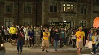 Dozens join protest outside University of Michigan president's Ann Arbor home