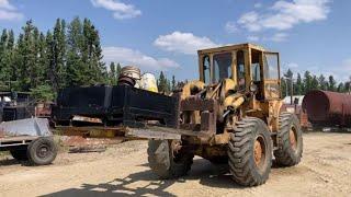 Operating the 922 Caterpillar Wheel Loader to Get Ready for Winter July 23 2024