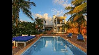 Full furnished Beachfront house for sale in Treasure Beach, St Elizabeth, Jamaica. Priced USD$699K