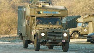 Army ambulances and medical vehicles transiting a field hospital 🪖