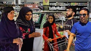 Shopping for the new house; Fariba and her daughter buy new goods