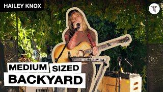 Hailey Knox Performs in the Medium Sized Backyard