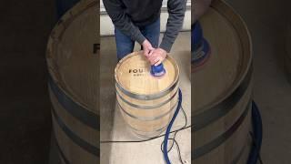 Removing the laser engraved logo on the end of a whiskey barrel