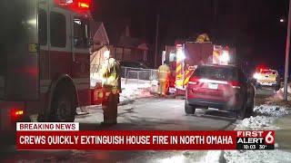 Crews fight fire in basement of North Omaha home