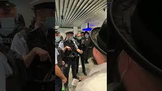 German Policeman reacts to being called a Nazi at the gate of Lufthansa 1334