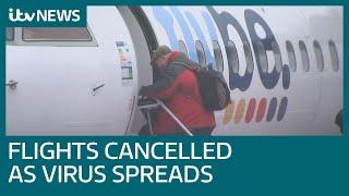 Airlines feel coronavirus squeeze as passengers cancel flights | ITV News