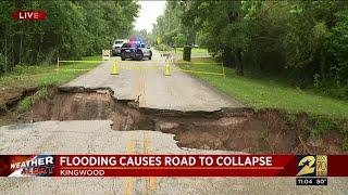 Flooding causes road to collapse