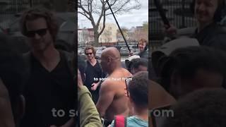 MIKE TYSON RIPS OFF HIS T SHIRT AS SHANNON BRIGGS PUTS IT ON HIM IN NEW YORK