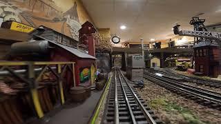 Model Train Layout ride along POV O-scale Diesel Locomotive Freight Train