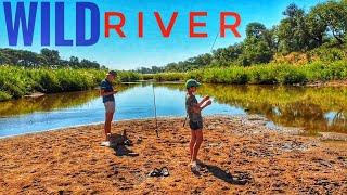 Fishing and walking down a wild African river